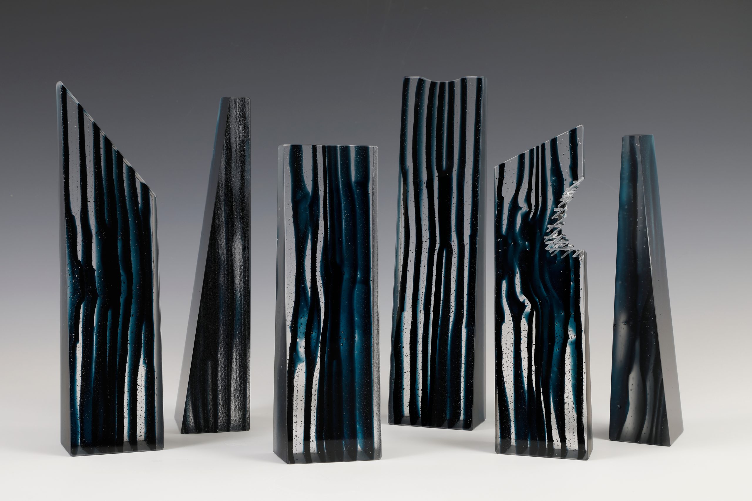 Us, solid glass sculptures